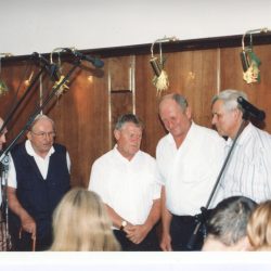 Vaški koledniki singing carols in Prešeren Hall, SAZU.