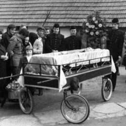 Miners from the Črna kaolin mine paying their respects at the funeral of a colleague from Hrvaško Zagorje, circa 1987. From the archive of Miro Dolinšek, Kališe.