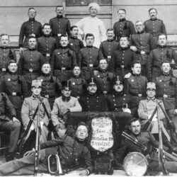 Most traditional Slovenian military songs were created after the introduction of compulsory military service; the duration of service was gradually shortened. Young men from Črna na Koroškem after completing their three-year military service, Graz 1914; SEM archives.