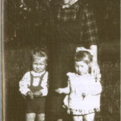 Terezija Petek, vulgo Trščeva Rezka (1910) with her grandchildren Stanko and Judita, Jurjevica, 1962